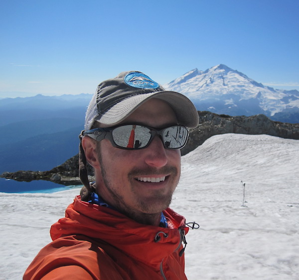 Nathan Russell on a mountain top