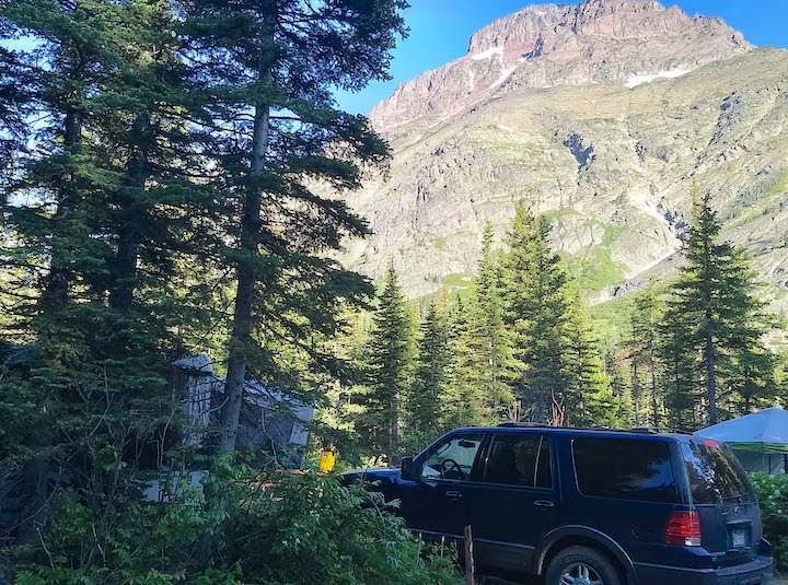 truck and camper with a mountain