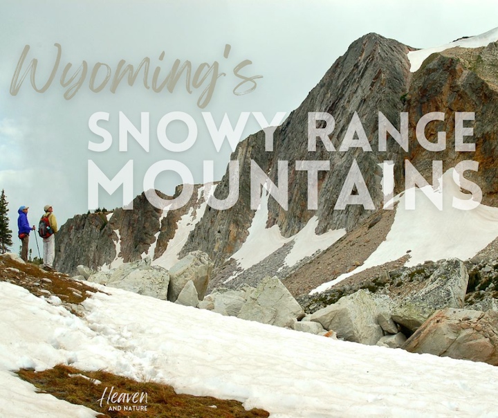 "Wyoming's Snowy Range Mountains" with image of two hikers looking up at the mountain peak