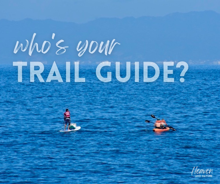 "who's your trail guide?" with image of two people kayaking on one paddleboarding on the ocean