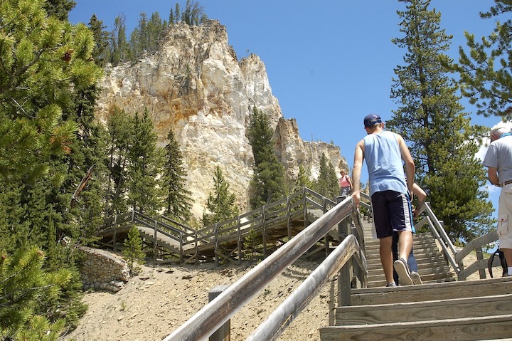 people climbing up the steps sections from Red Rock Point in the Yellowstone Canyon