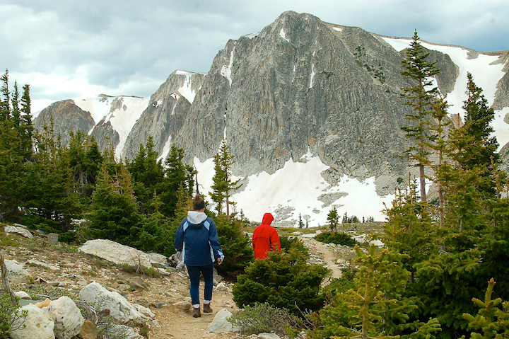 hikers on a mountain trail in the Snowy Range Mountains