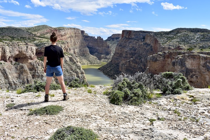 woman overlooking river and canyon