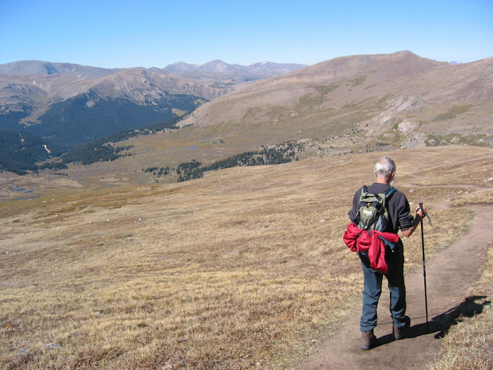 older man hiking in the mountains