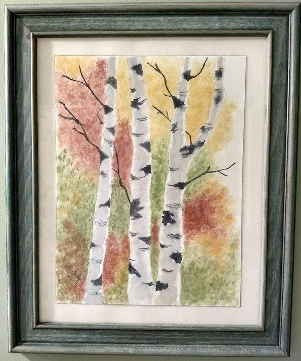 framed watercolor painting of three birch trees