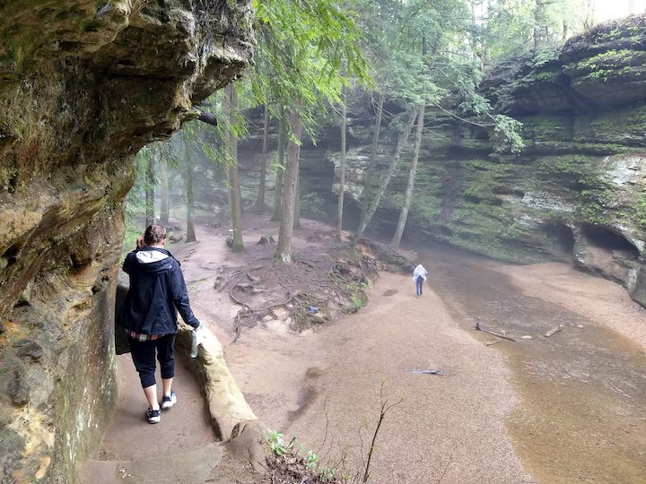 woman on narrow trail, Hocking Hills, Ohio