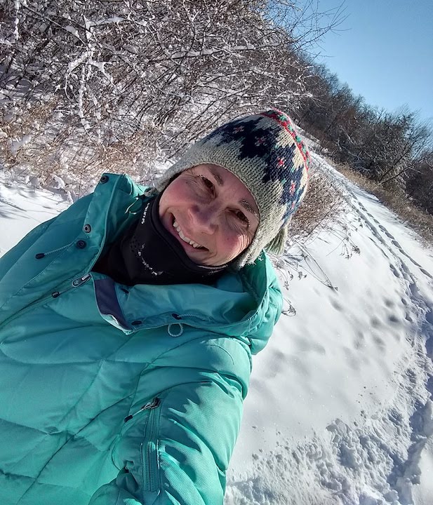 woman hiking in the snow