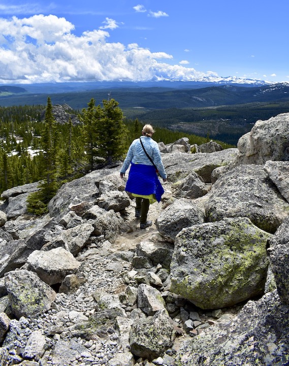 Sharon hikes on a rocky trail near the top of Black Mountain in the Bighorns