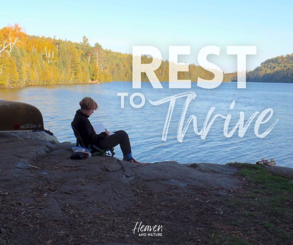 "Rest to Thrive" with image of woman sitting at a lakeshore journaling