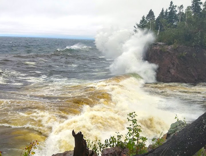big waves hit the rocky shore on Lake Superior