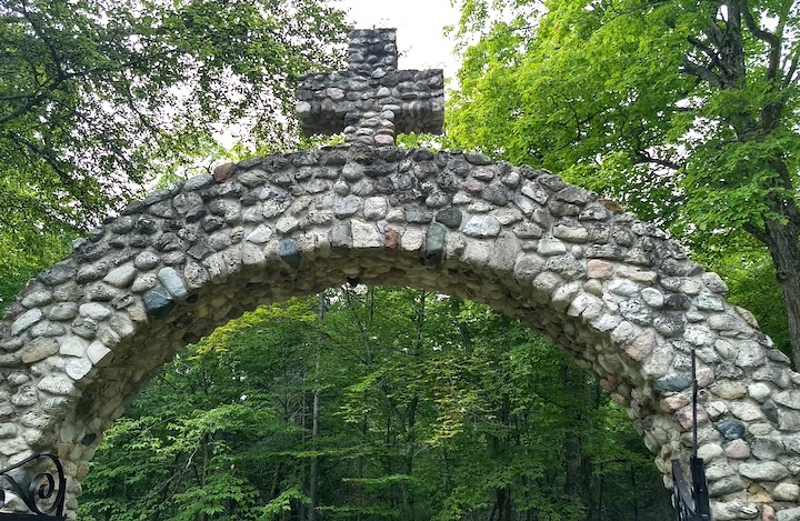 stone arch with cross