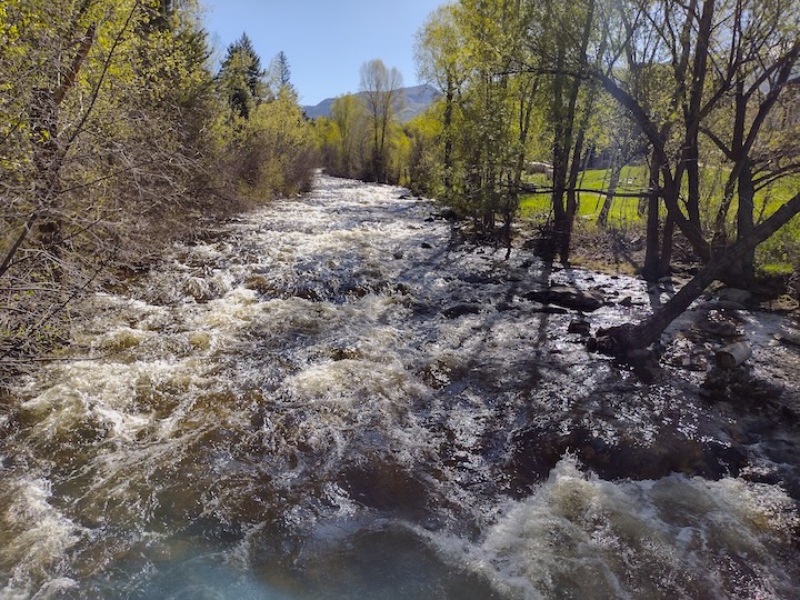 a fast-flowing river in Colorado in the spring